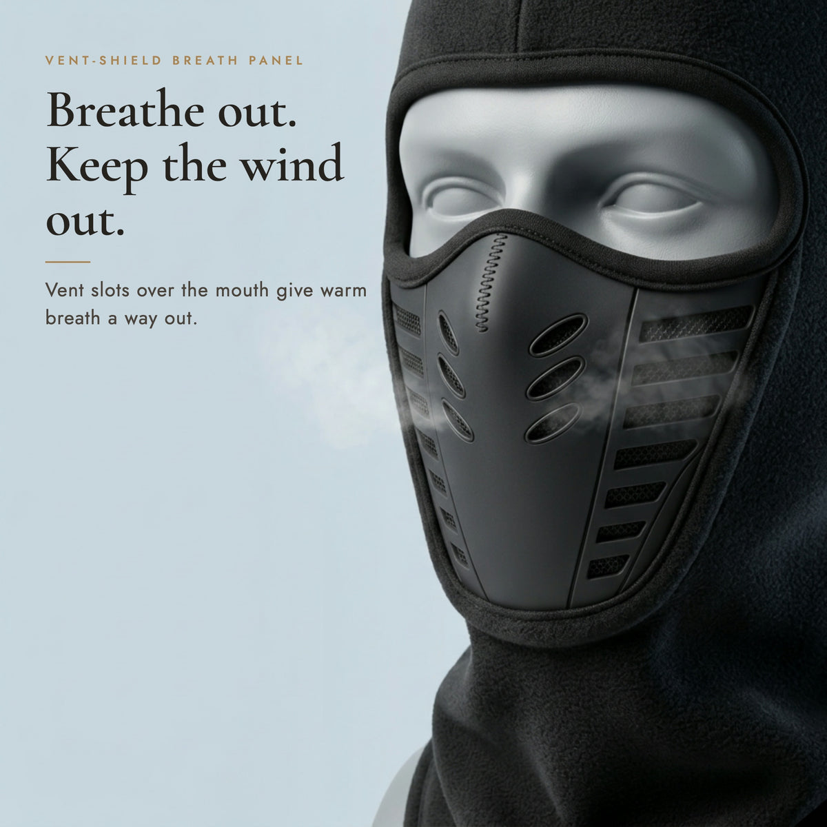 Close-up of the vented breath panel on the black fleece balaclava, headline Breathe out. Keep the wind out.